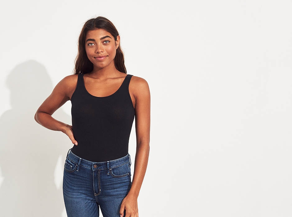 Model in black tank top