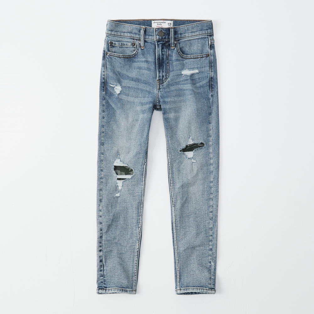 camo-backed taper jeans